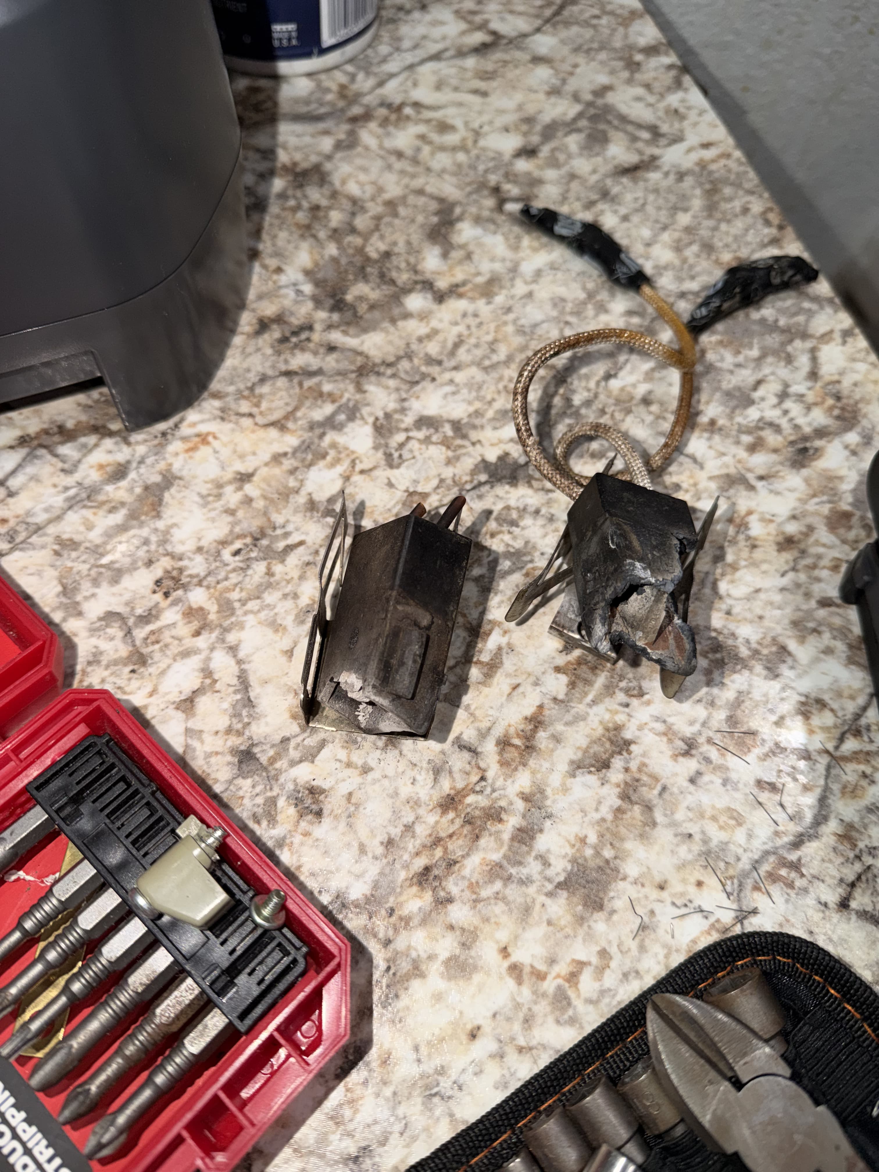 Burnt and damaged burner connector removed from the Hotpoint range
