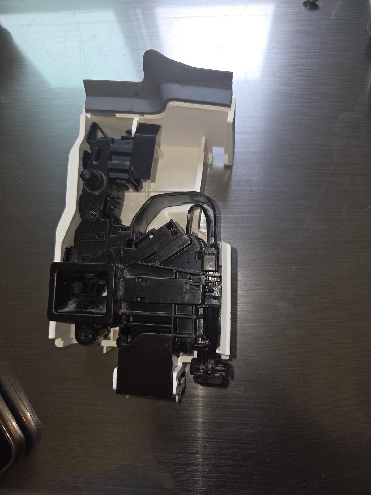 Faulty door lock assembly removed from the Samsung washer